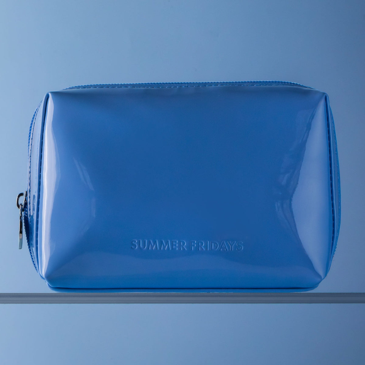 glossy-pouch-in-jet-lag-blue-x3 Glossy-Pouch-Jet-Lag-2.jpg