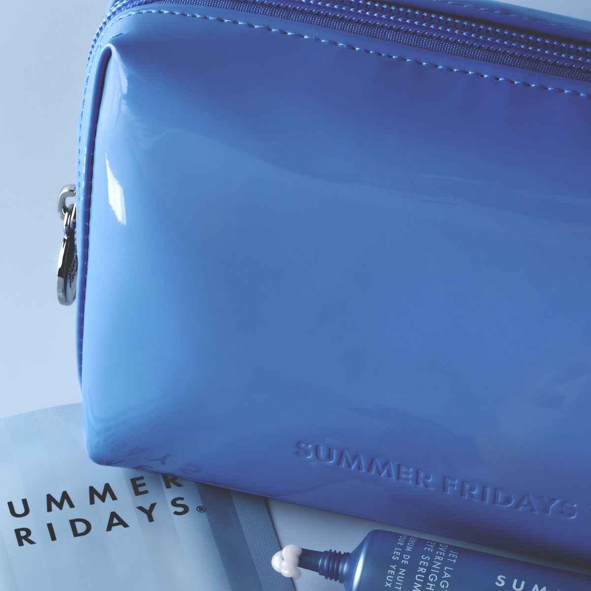 glossy-pouch-in-jet-lag-blue-x3 Glossy-Pouch-Jet-Lag.jpg